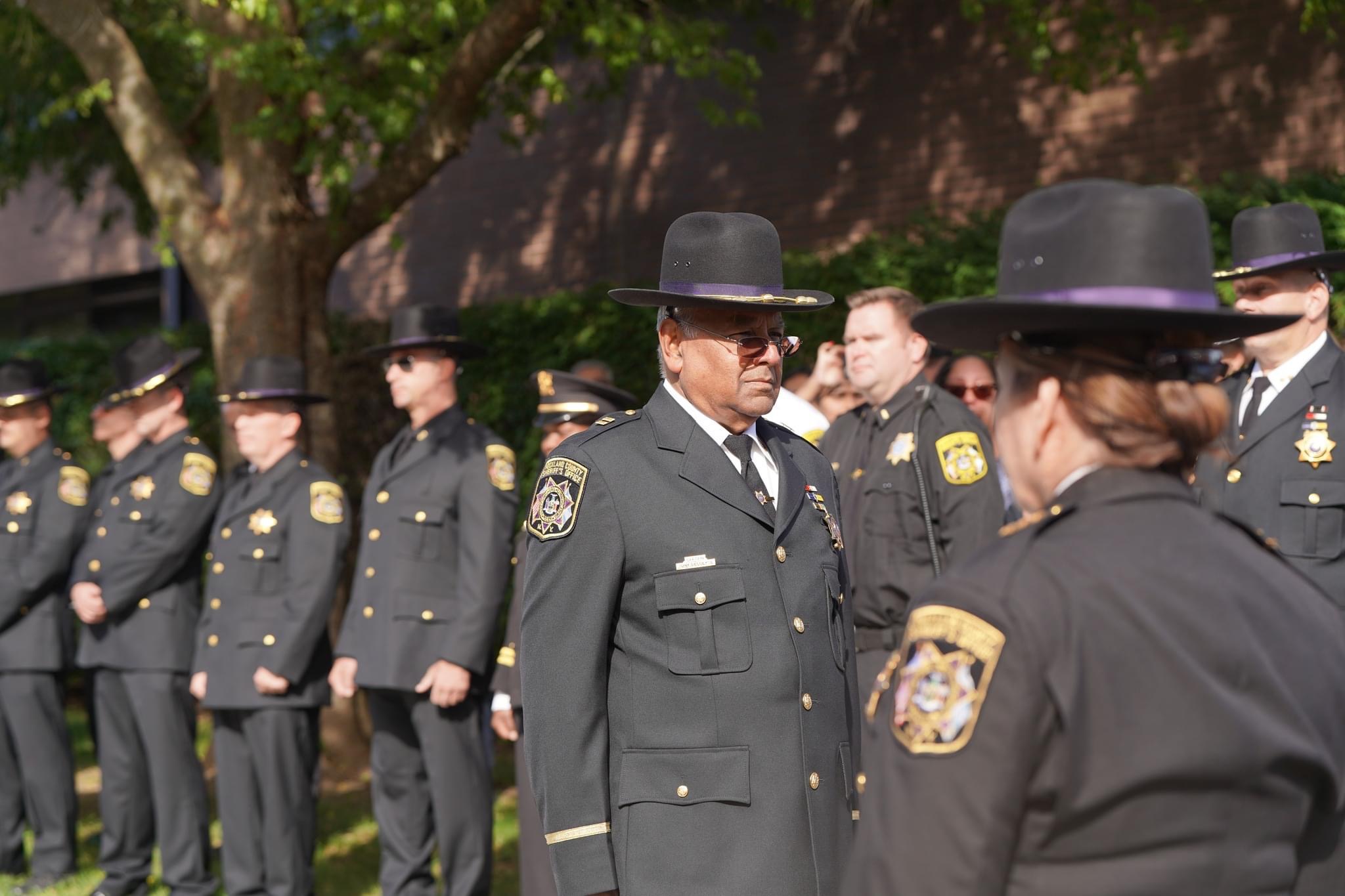 Officers wearing their uniforms