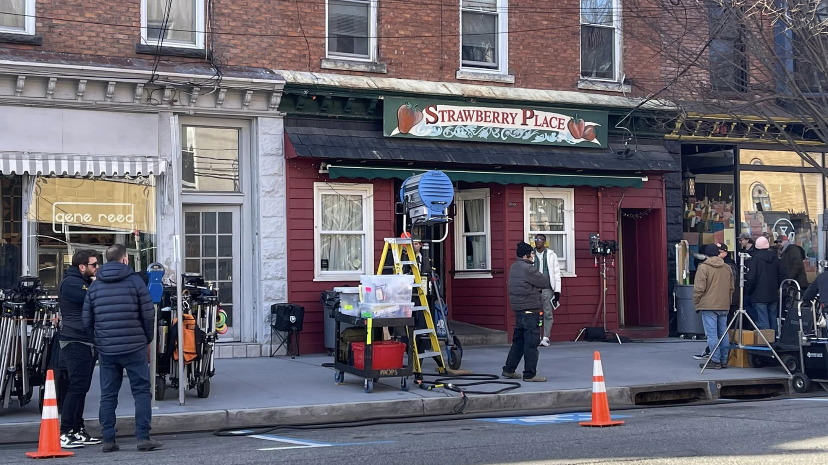 A production crew outside of Strawberry Place store