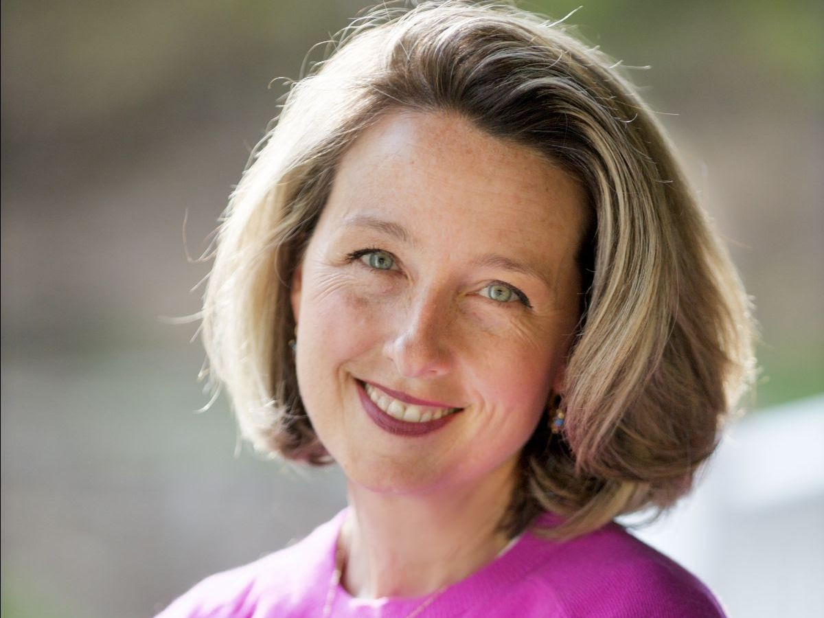 A smiling woman with short hair