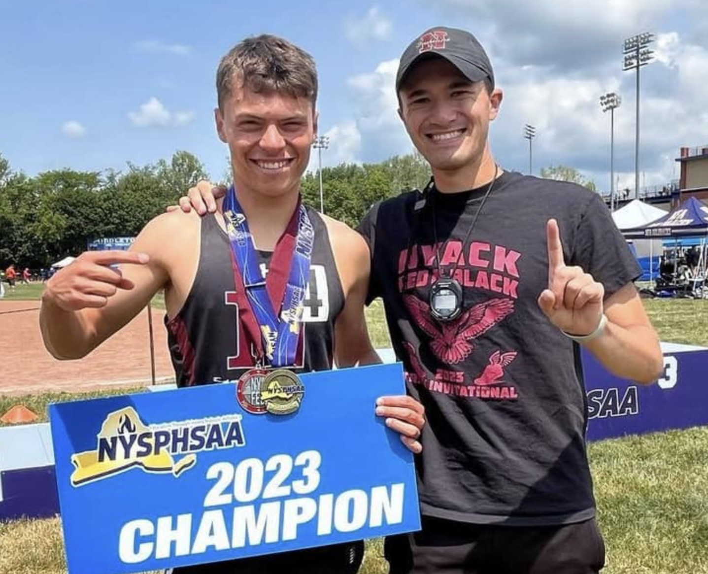 A young man who won the NYSPHSAA with his coach